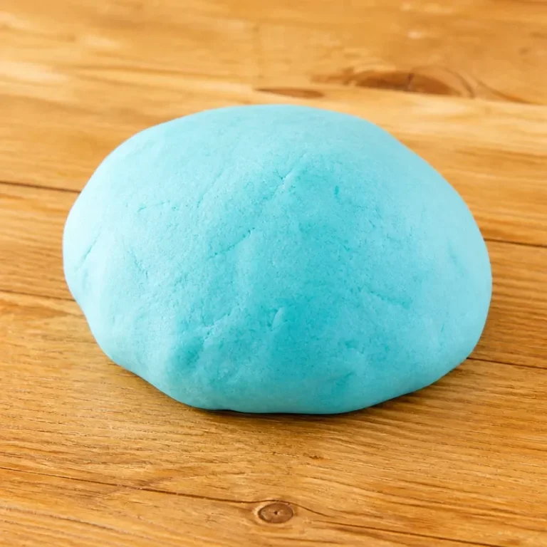 Kids playing with fluffy cloud dough play dough, enjoying sensory activities.